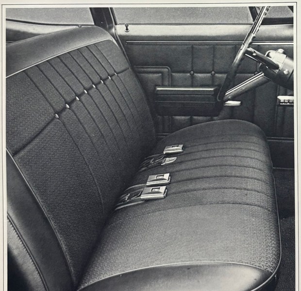 Executive interior — front bench seat and door trim