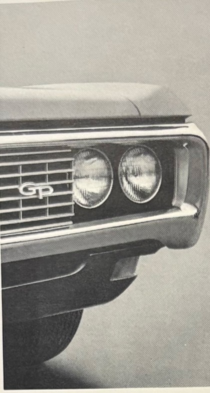 Grand Prix with headlamps exposed