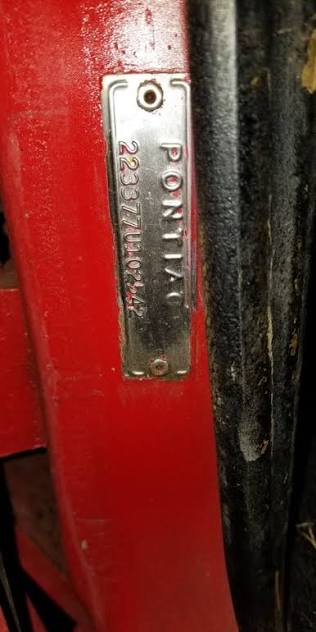 1967 VIN plate on the driver's door hinge pillar